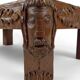 Solid oak coffee table carved with fauns and gray marble top, France, circa 1940