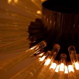 Radiant glass tube chandelier. Contemporary design.