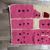 Handmade pure wool rug in pink, size 150 x 250 cm.