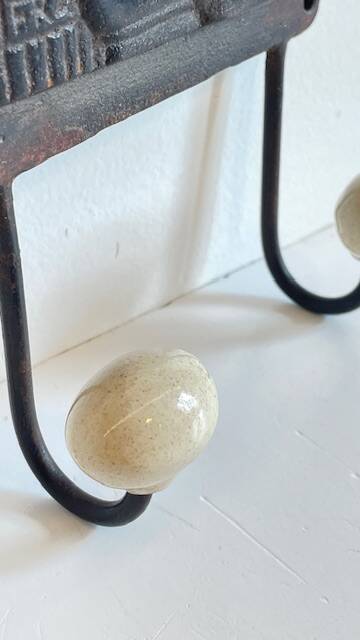 Coat rack made of steel and porcelain