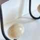 Coat rack made of steel and porcelain