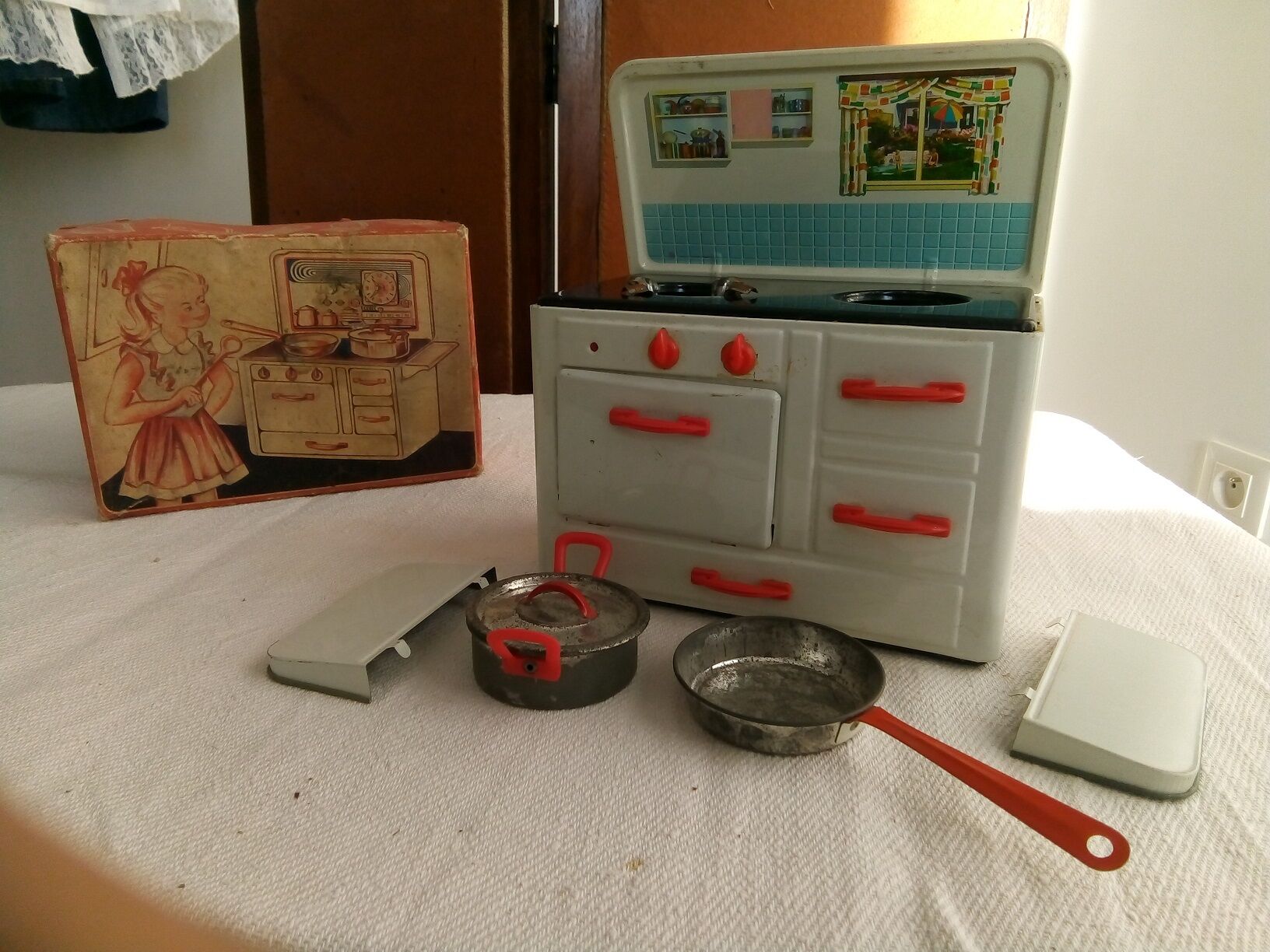 Toy old cook doll sheet metal