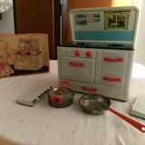 Toy old cook doll sheet metal