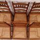 Extendable walnut table, 6 caned chairs in Henri II Neo-Renaissance style.