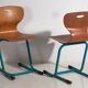 Vintage turquoise blue school chairs (c.1950). Set of 4 pieces.
