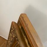 Antique mirror in gilded wood