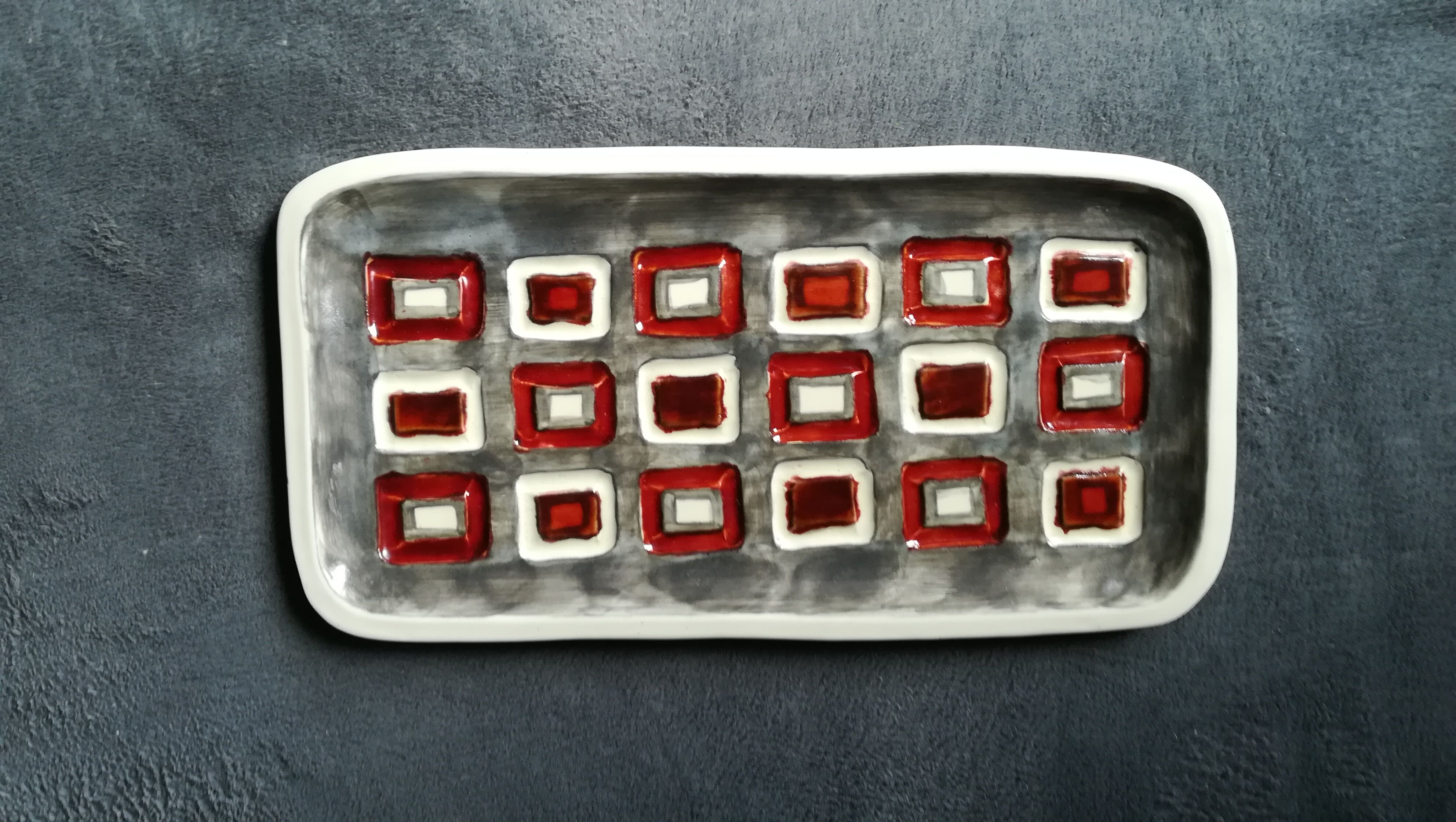 Empty ceramic pocket, circa 1950, signed.