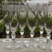 Set of 6 antique crystal champagne flutes. Engraved frieze.