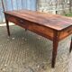 Antique farmhouse table in solid cherry wood with 3 drawers.