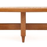 Oval coffee table by Guillerme and Chambron