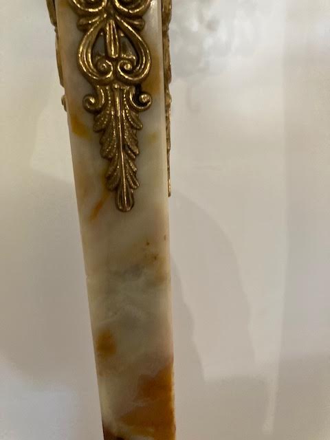 Marble and brass coat rack
