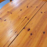 Suite of a round table with extension and 4 vintage pine chairs from the 60s and 70s