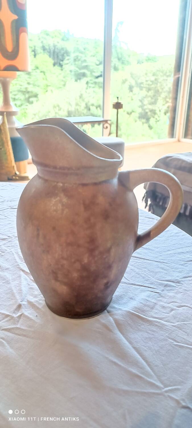 Jug, iridescent glazed stoneware carafe.