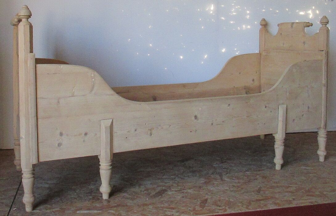 Retractable sofa bed of the Austrian Tyrole in natural wood