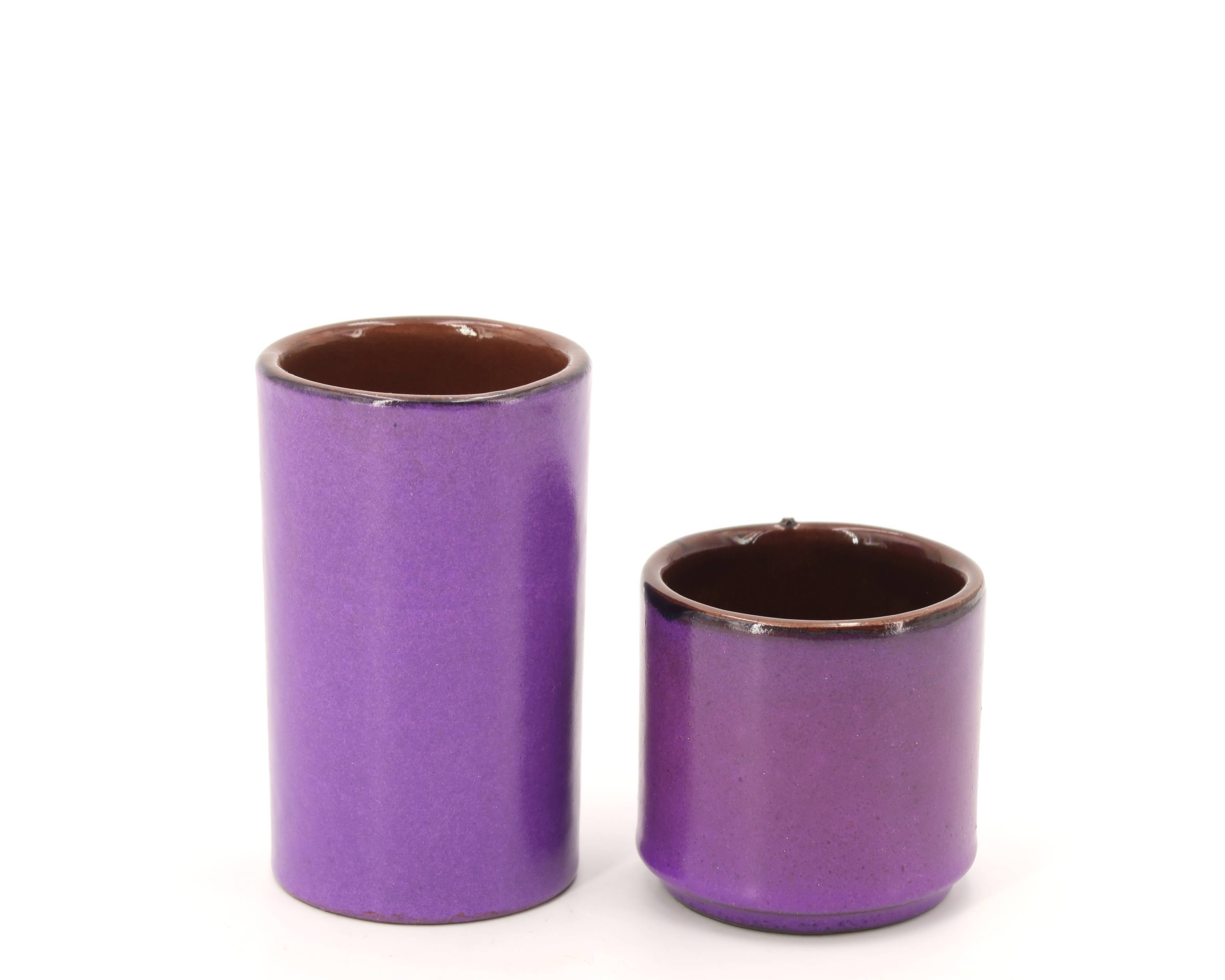 Two purple ceramic roller vases, 1970s