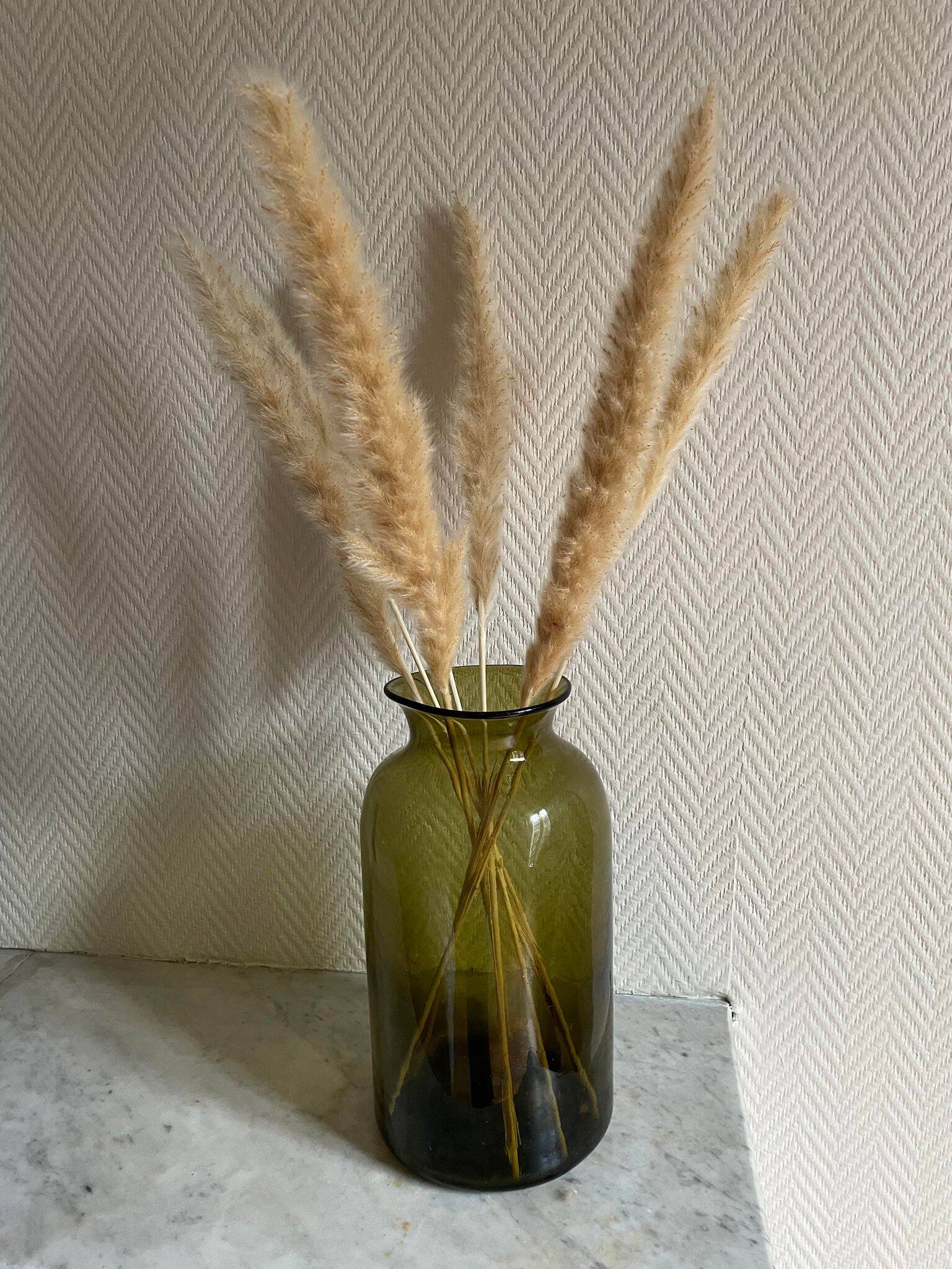 Large green blown glass vase