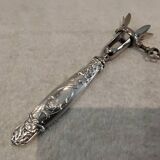 Silver-plated metal leg of lamb handle in art nouveau style