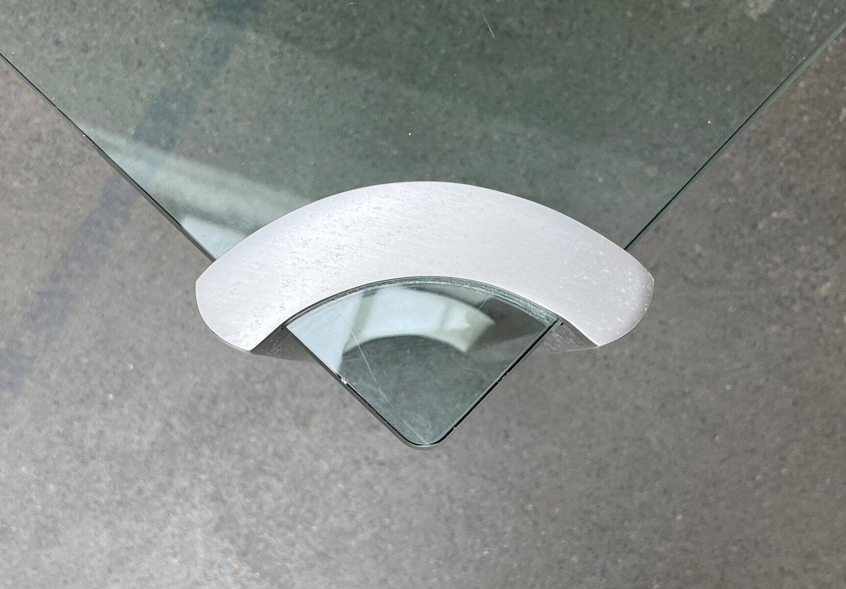 Vintage Space Age coffee table in glass and aluminium attributed to Peter Ghyczy, 1970s.