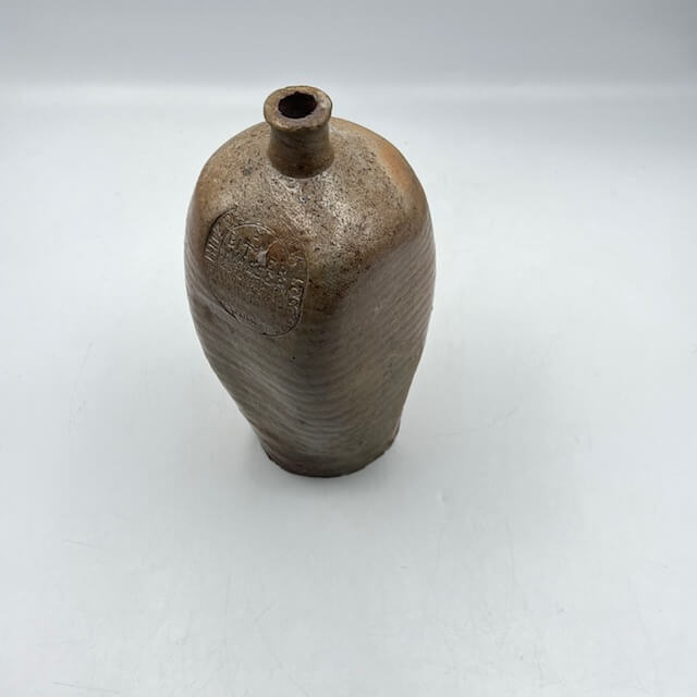 Engraved and square stoneware bottle