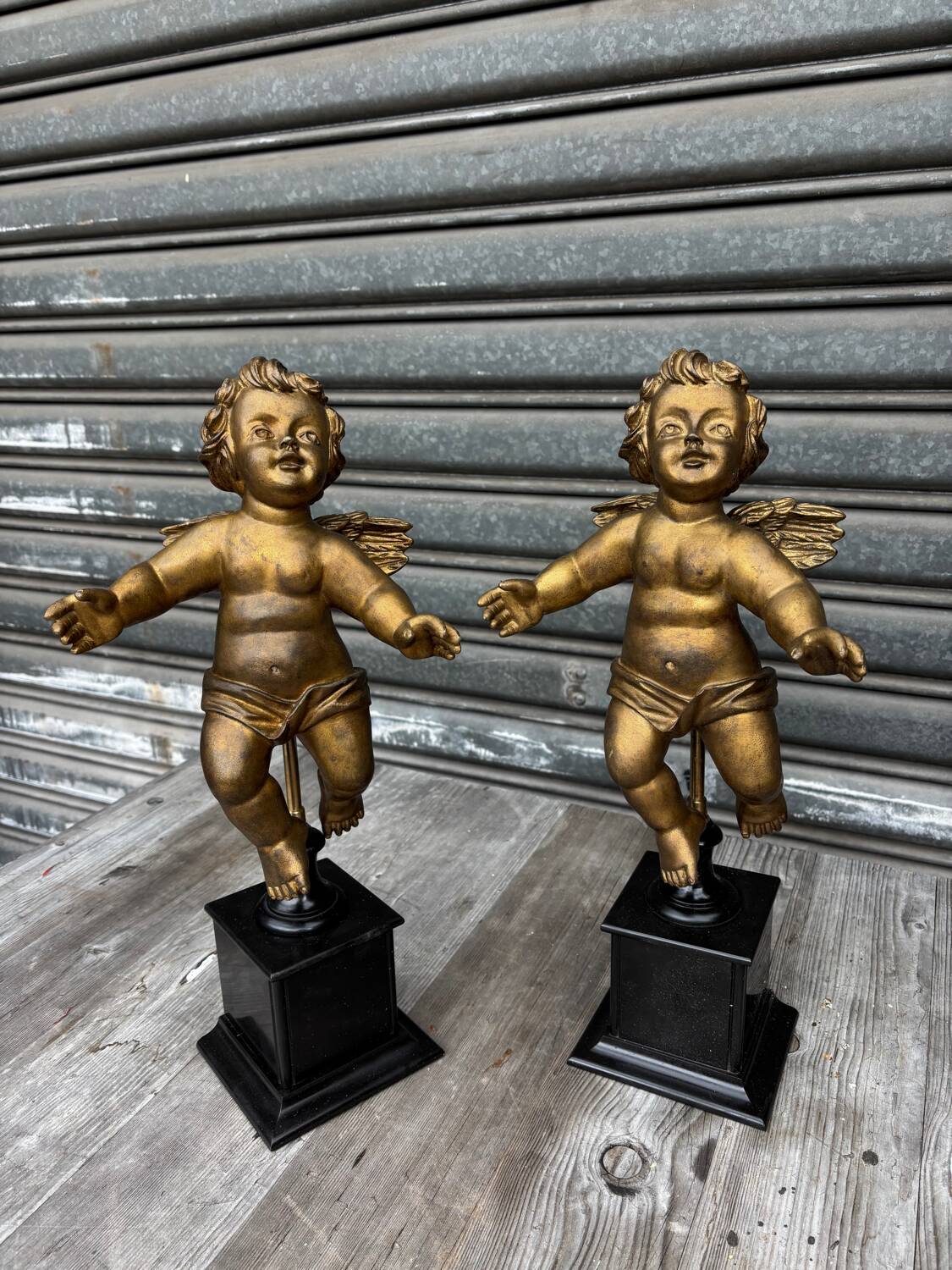 Pair of gilded cherubs on a Napoléon III base