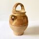 Old ochre and yellow glazed ceramic jug / goat