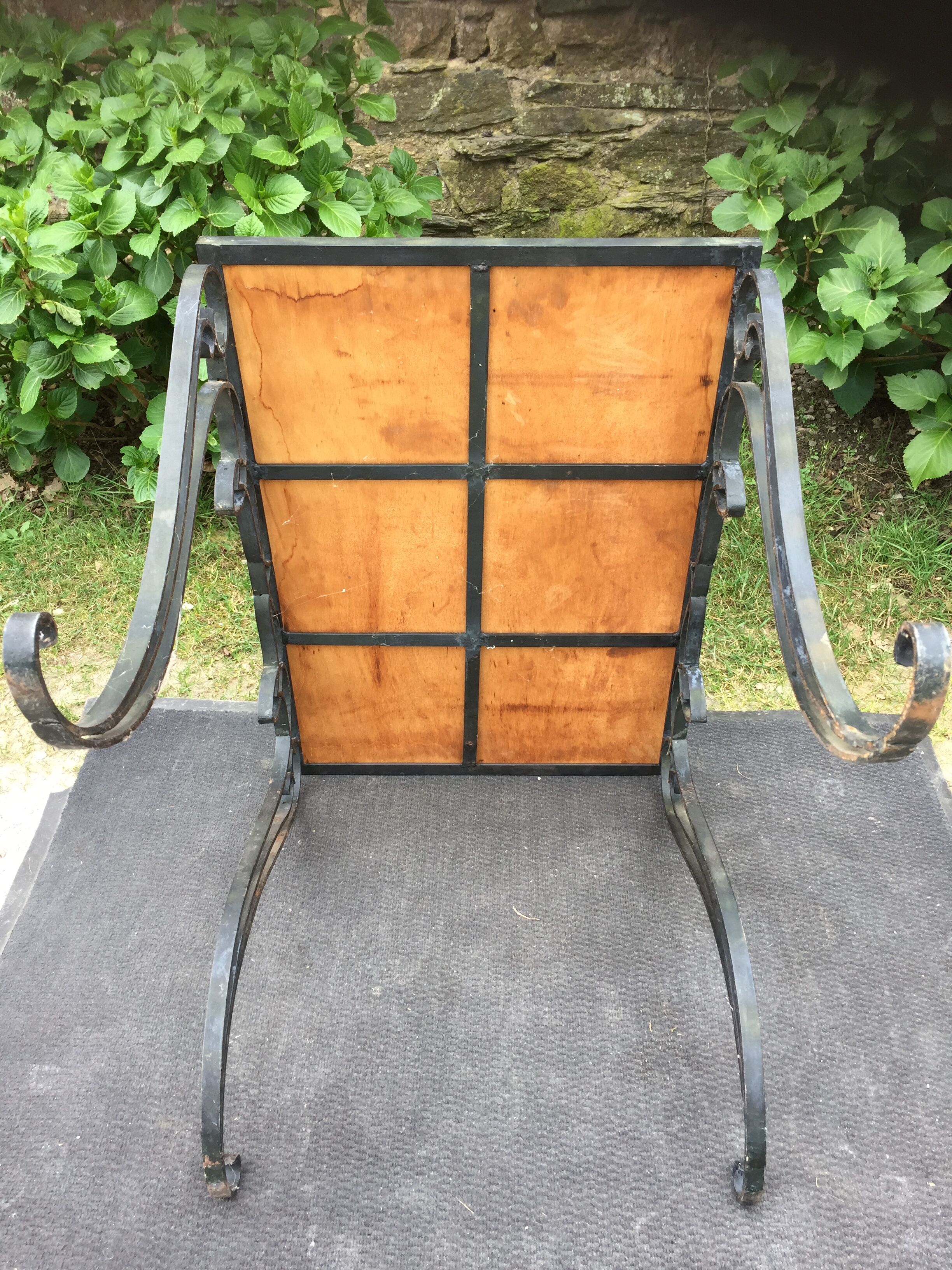 Vintage ceramic coffee table by Guy Trévoux with wrought iron base.