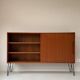 Vintage wooden sideboard with sliding door