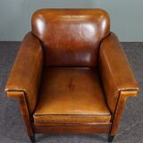 Schapenleren armchair and studio lounge stool