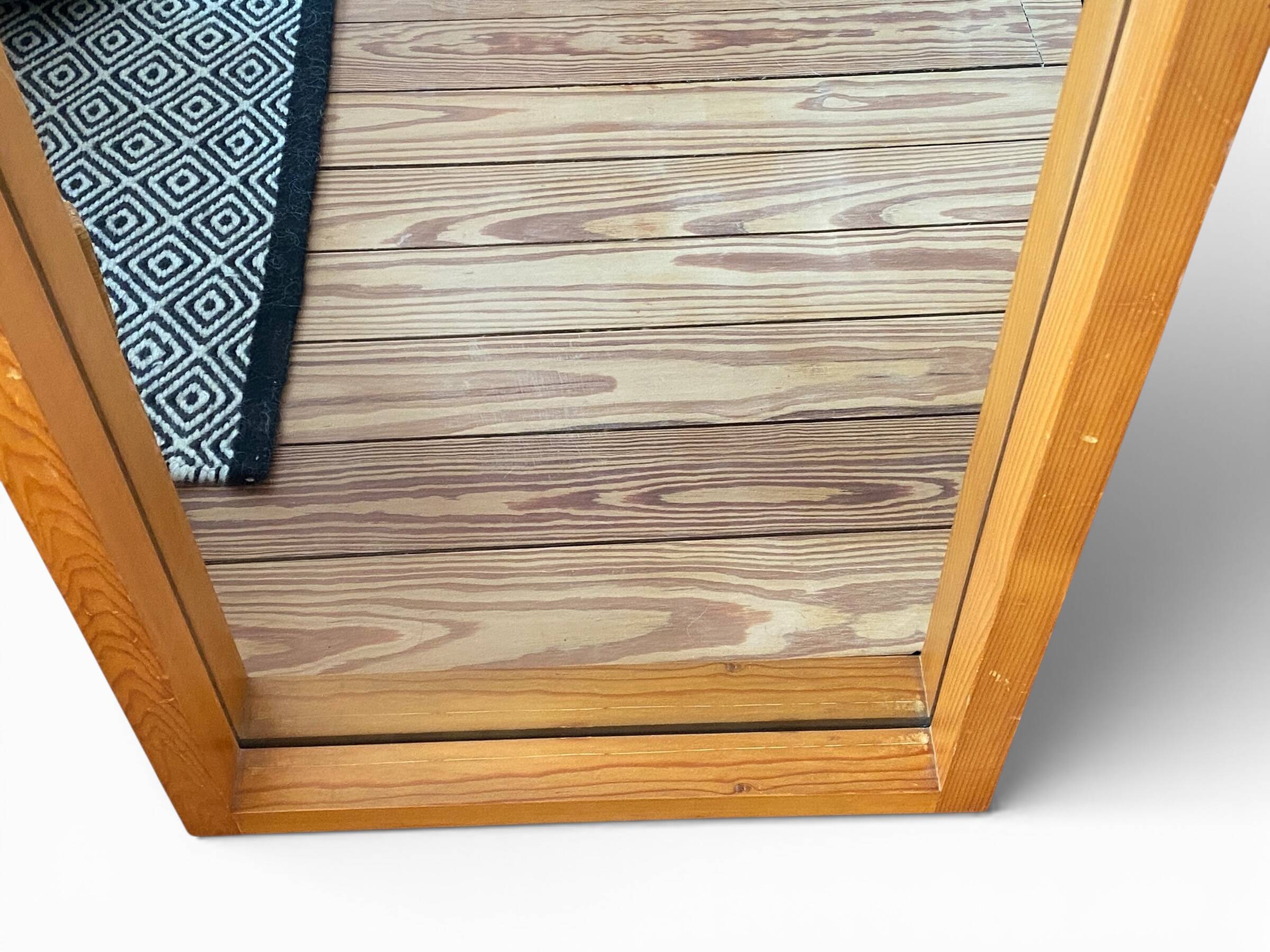 Modernist mirror in solid elm from the 1950s.