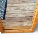 Modernist mirror in solid elm from the 1950s.