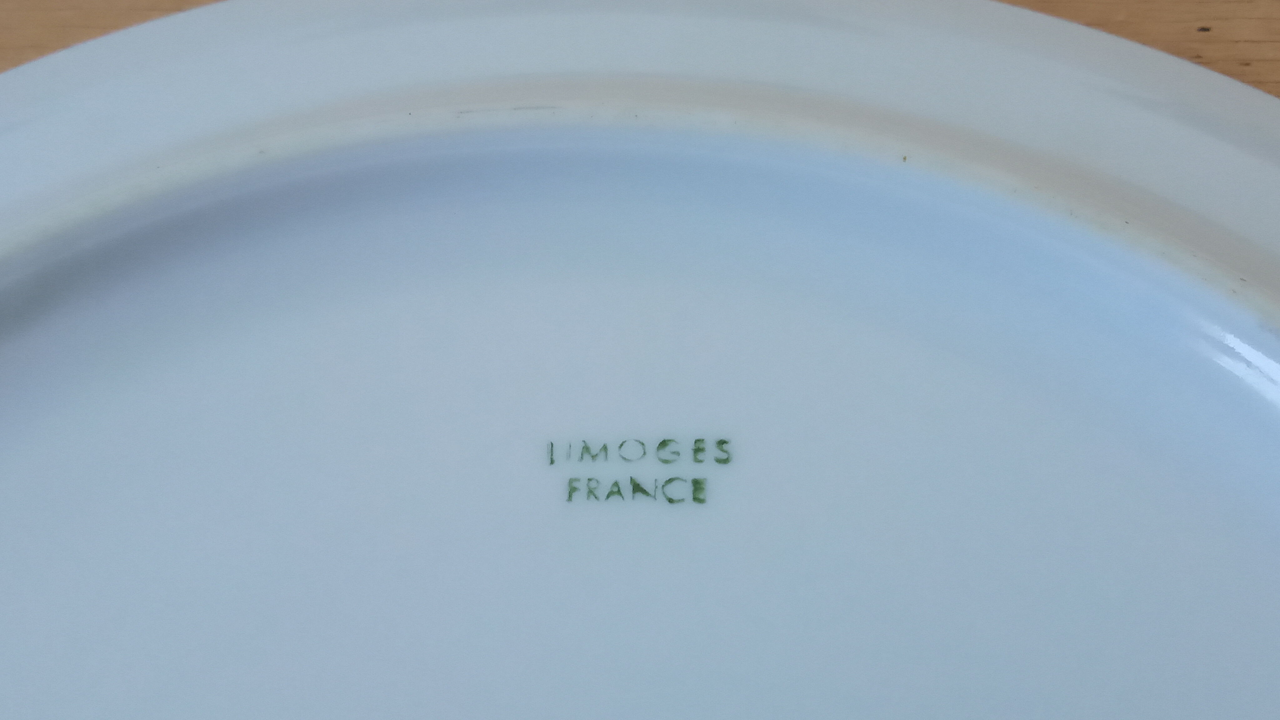 Six Limoges porcelain plates