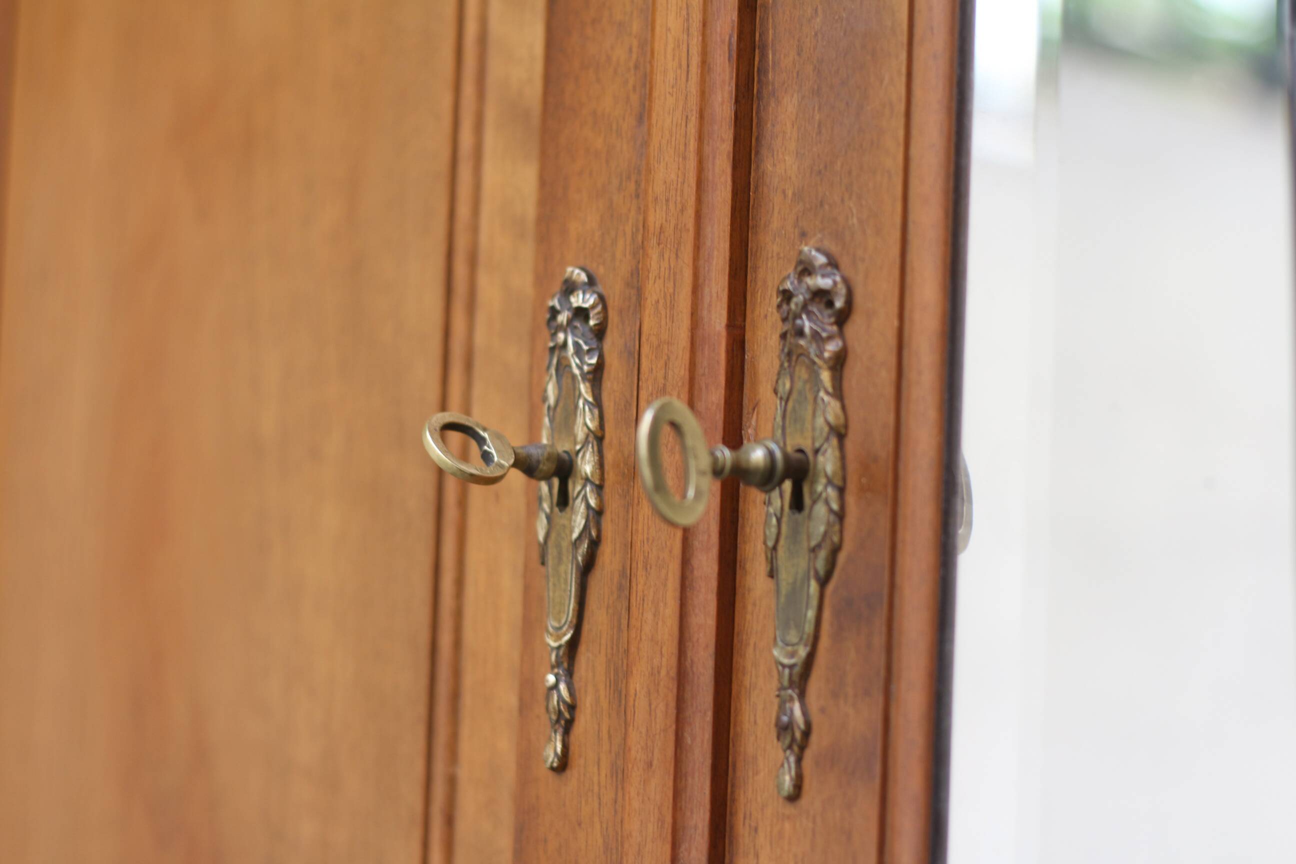 Majestic solid walnut wardrobe. Stamped work, late 19th century.