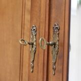 Majestic solid walnut wardrobe. Stamped work, late 19th century.