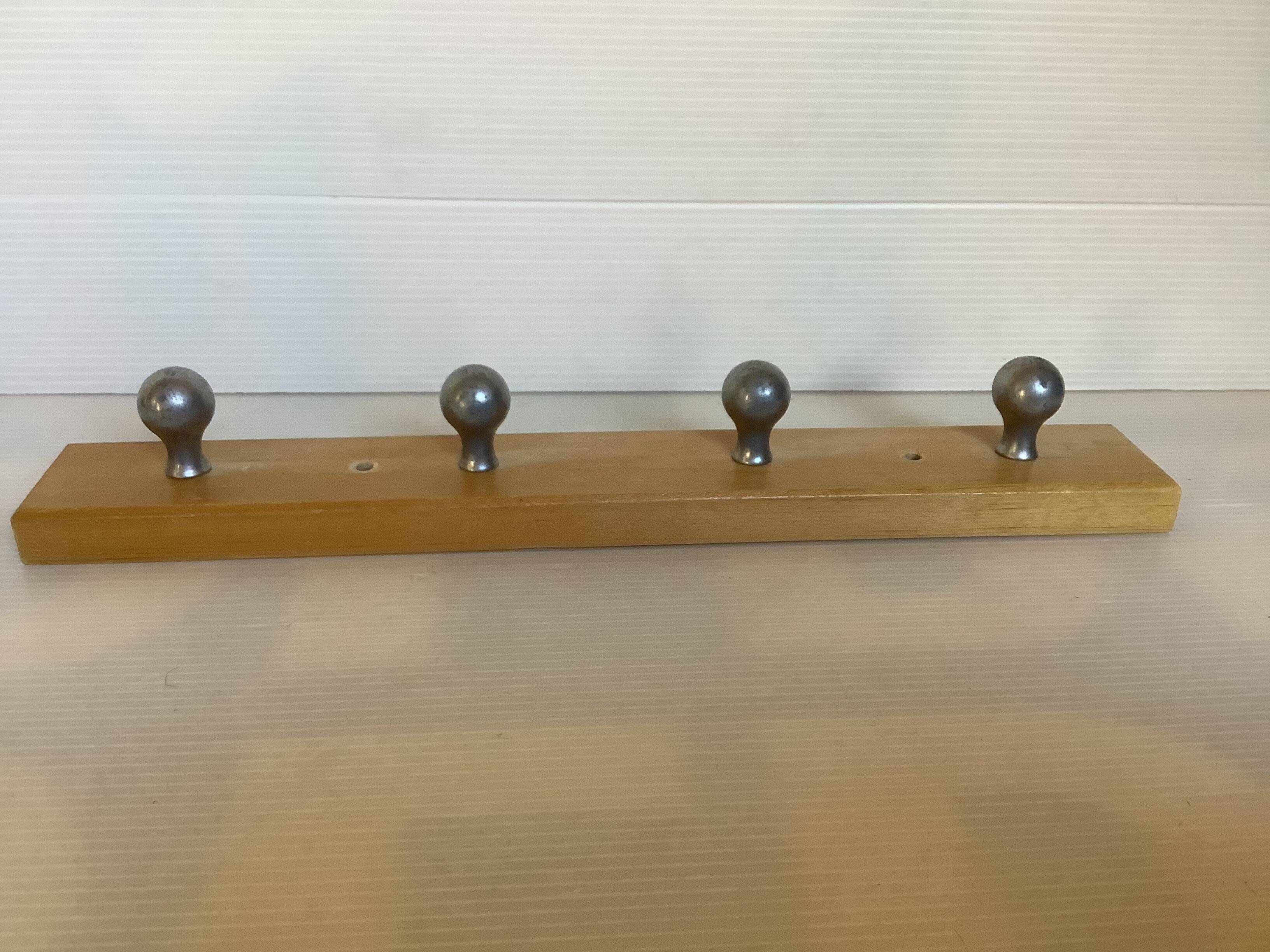 Wooden metal ball tea towel holder