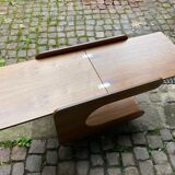 Rolling teak coffee table with foldable top circa 1960