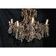 House Lucien Gau's gilded bronze and crystal chandelier