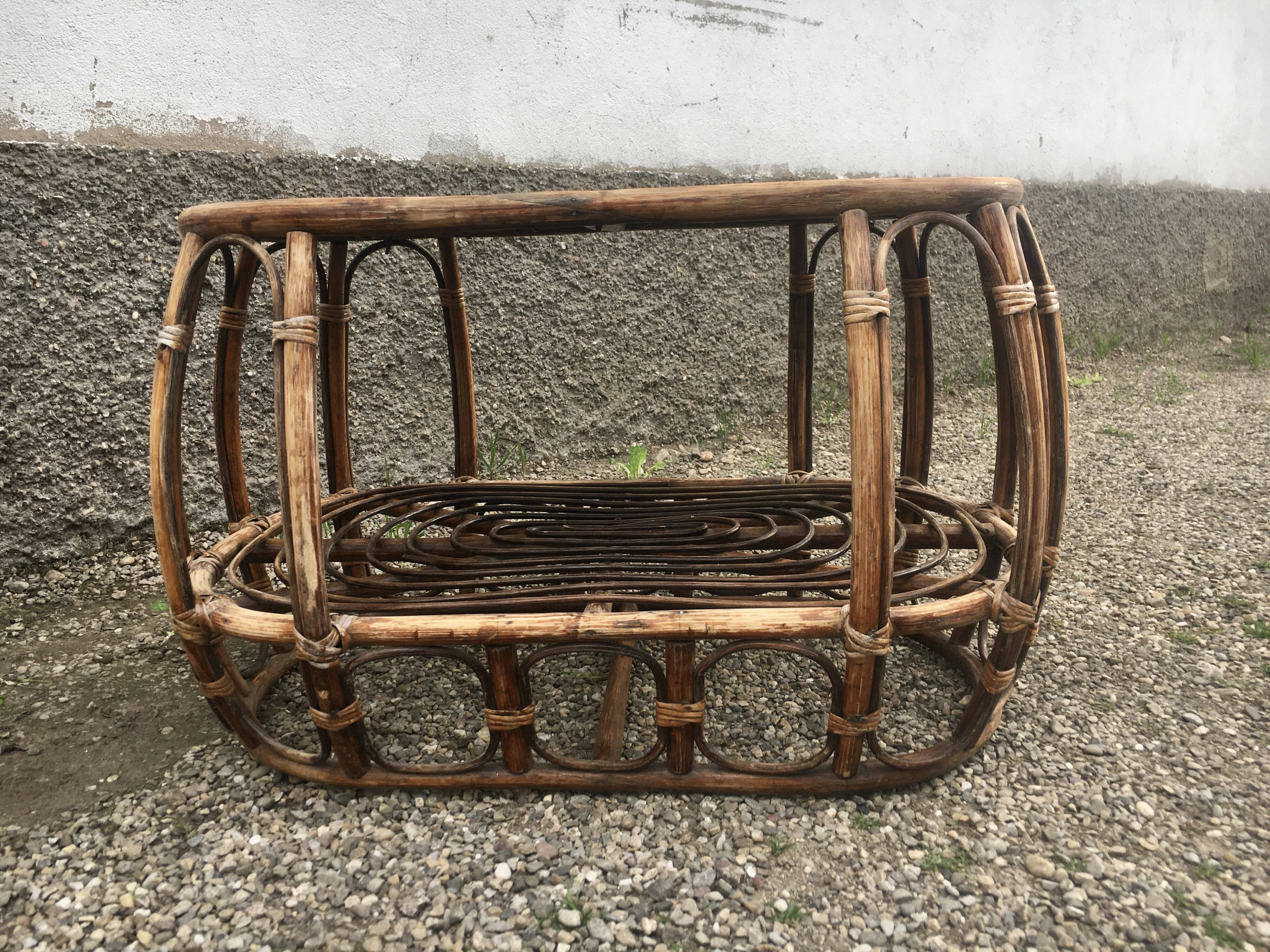 Pair of rattan armchairs and vintage oval table