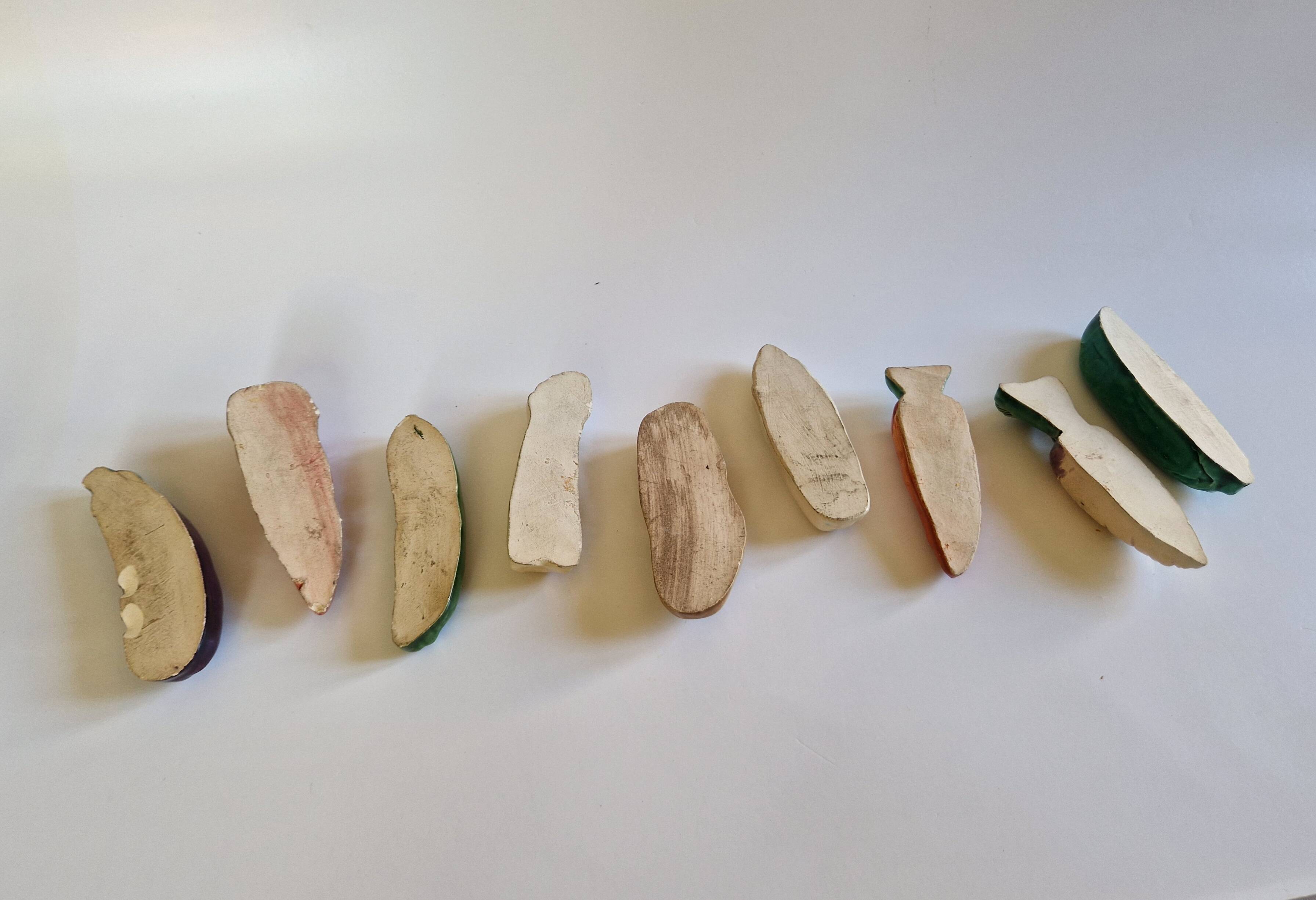 Set of 9 vintage ceramic vegetable knife holders