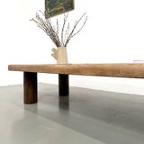 XXL oval coffee table in solid oak, cylindrical base, 1950s.