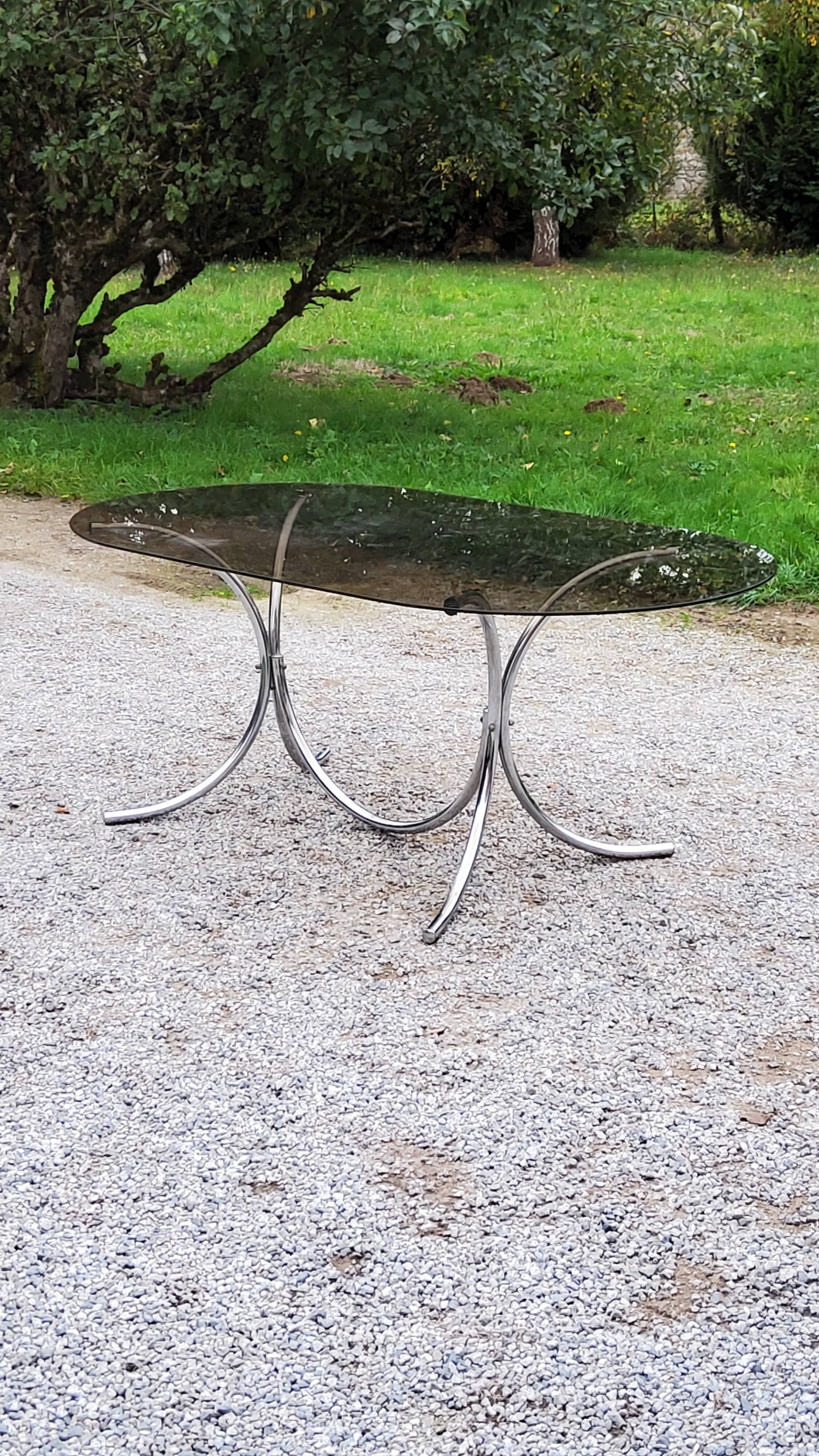 Dining table from the 70s top smoked glass base chrome