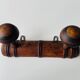 Wooden wall-mounted coat rack with two hooks