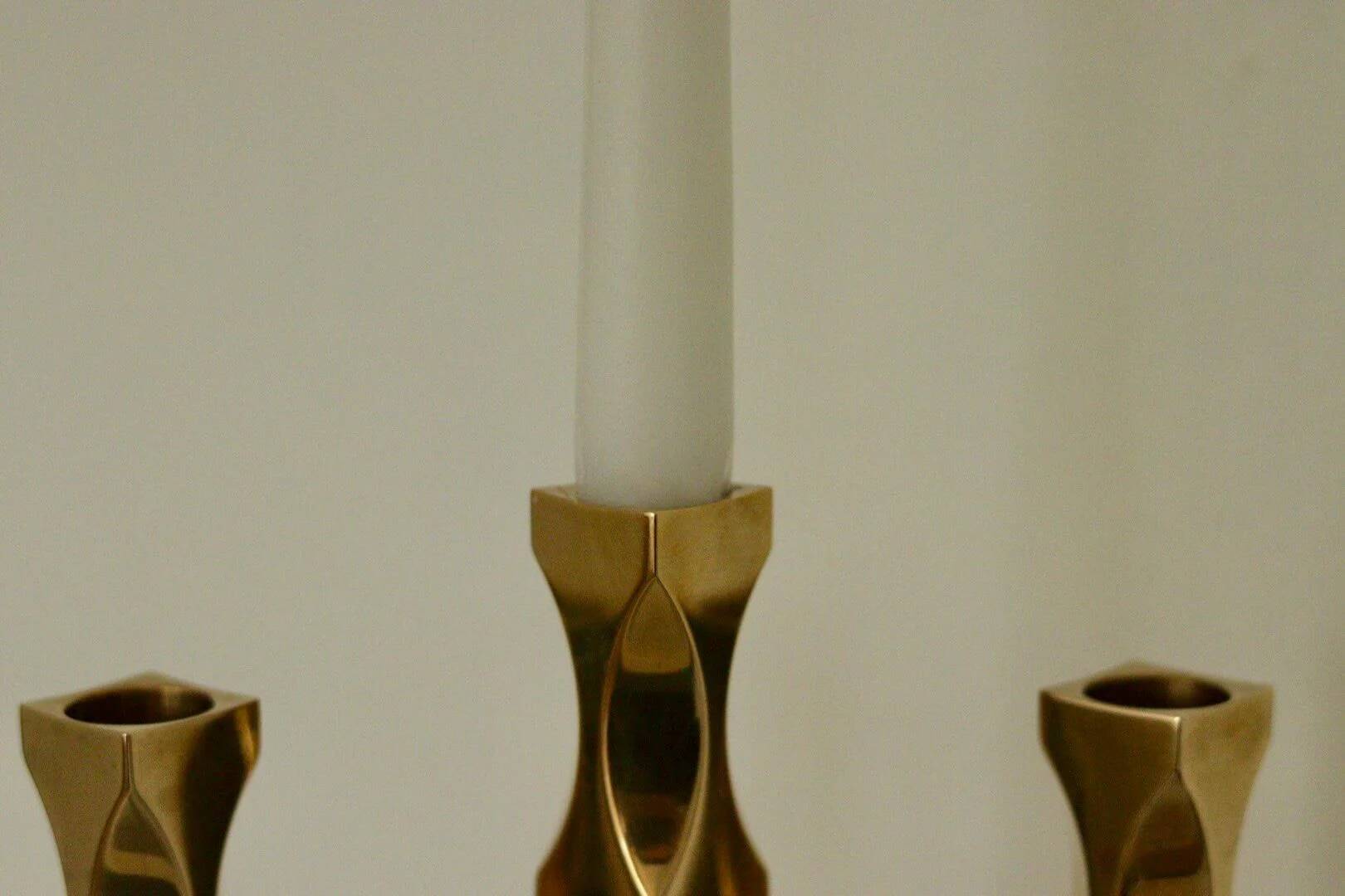 Swedish three-armed candelabrum in brass by Lars Åkesson for Vallonmässing