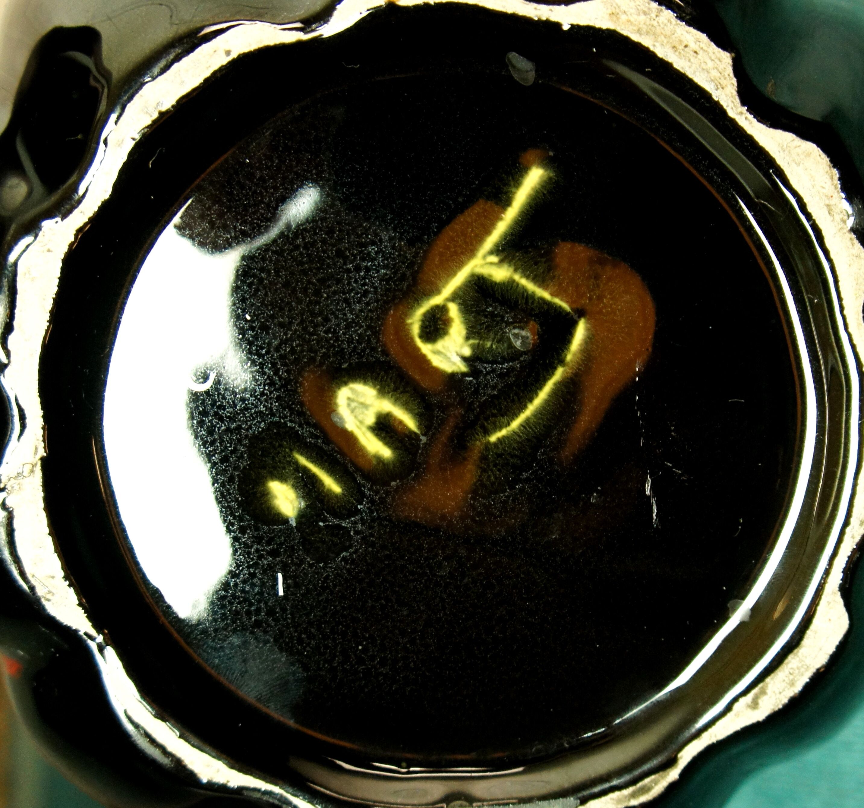 Signed ceramic pot cover