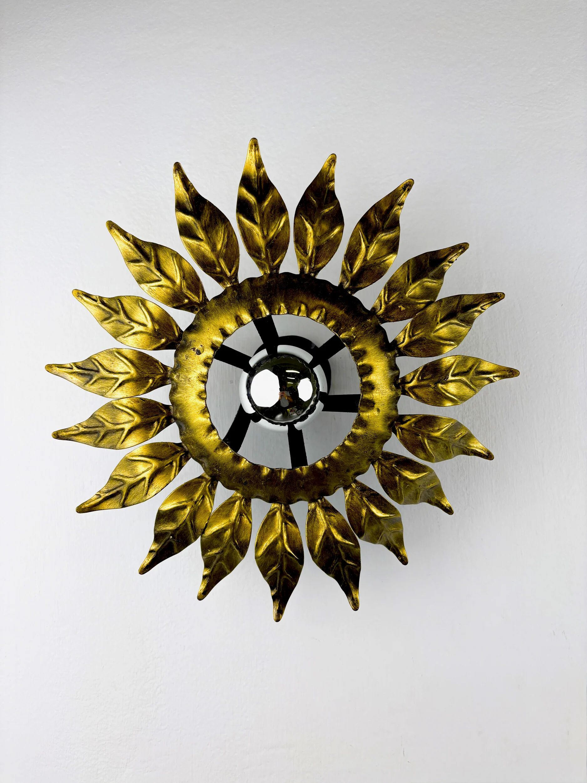 Sunburst ceiling light fixture or sconce in gilt wrought iron, Spain, circa 1960s