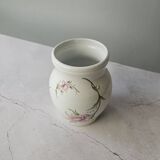 Vintage white porcelain vase by Revol with pink flowers.