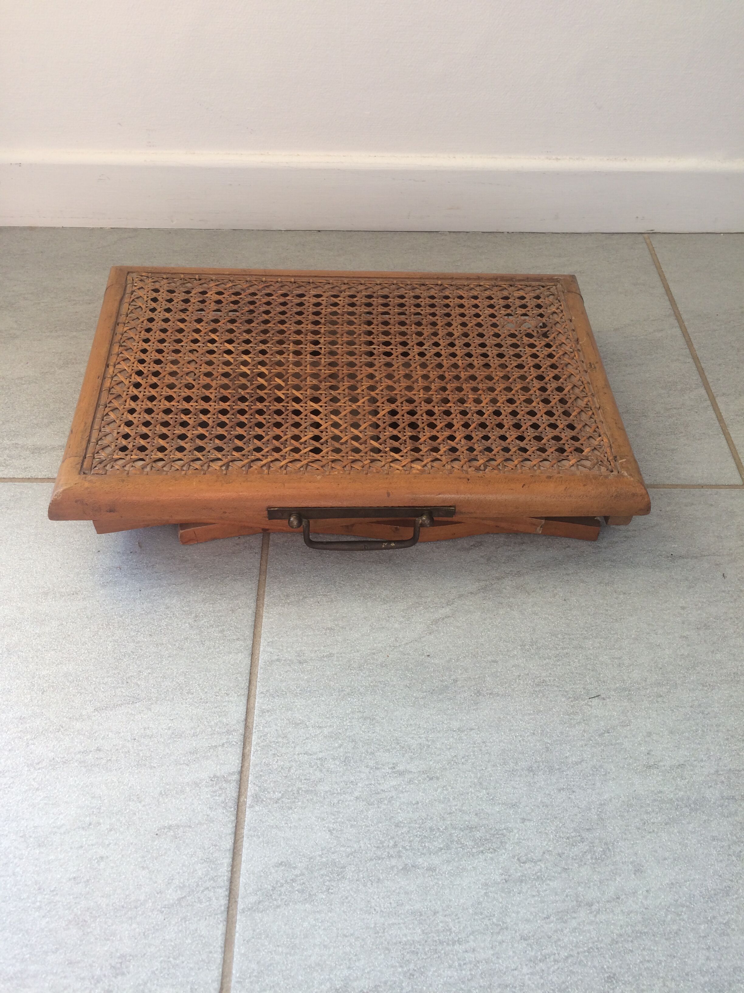 Folding stool in old caning