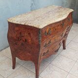 Louis XV curved chest of drawers in rosewood marquetry