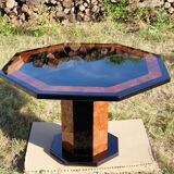 Octagonal table paul michel lacquered black and elm magnifying glass