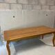 Wooden dining table with curved legs – authentic charm