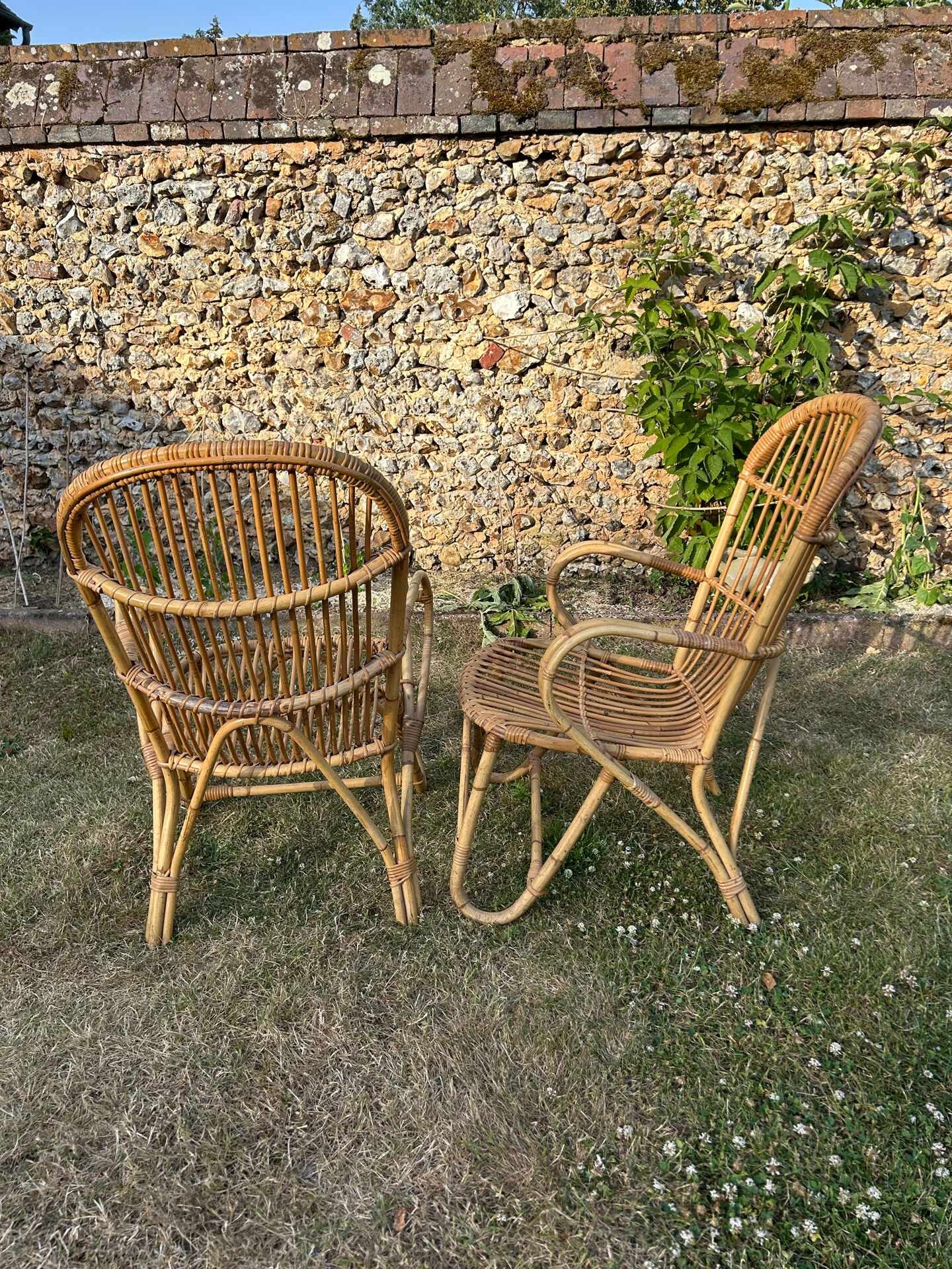 Pair of vintage rattan armchairs from the 1960s.